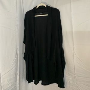 Cardigan with sleeve slits